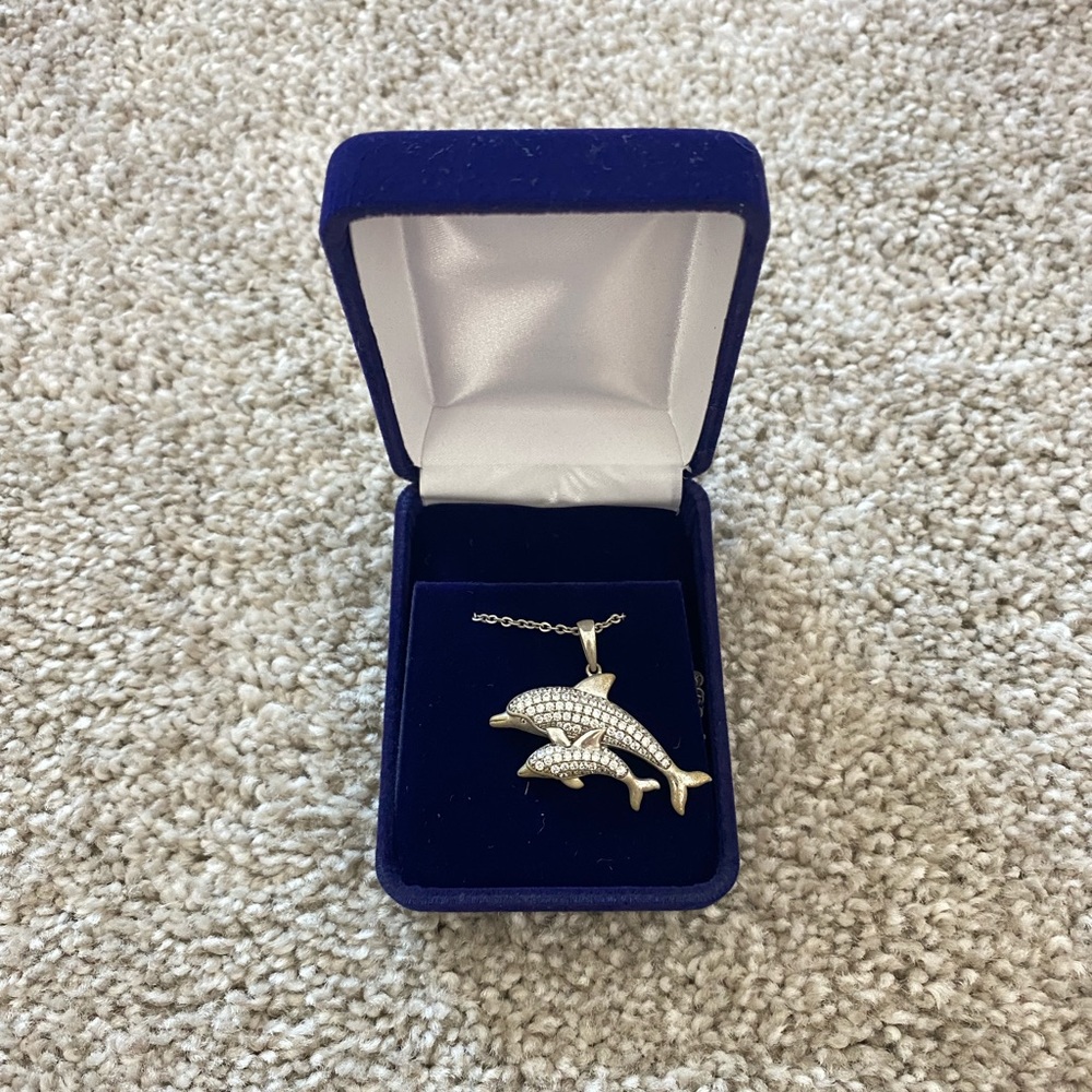 Dolphin necklace in hood condition